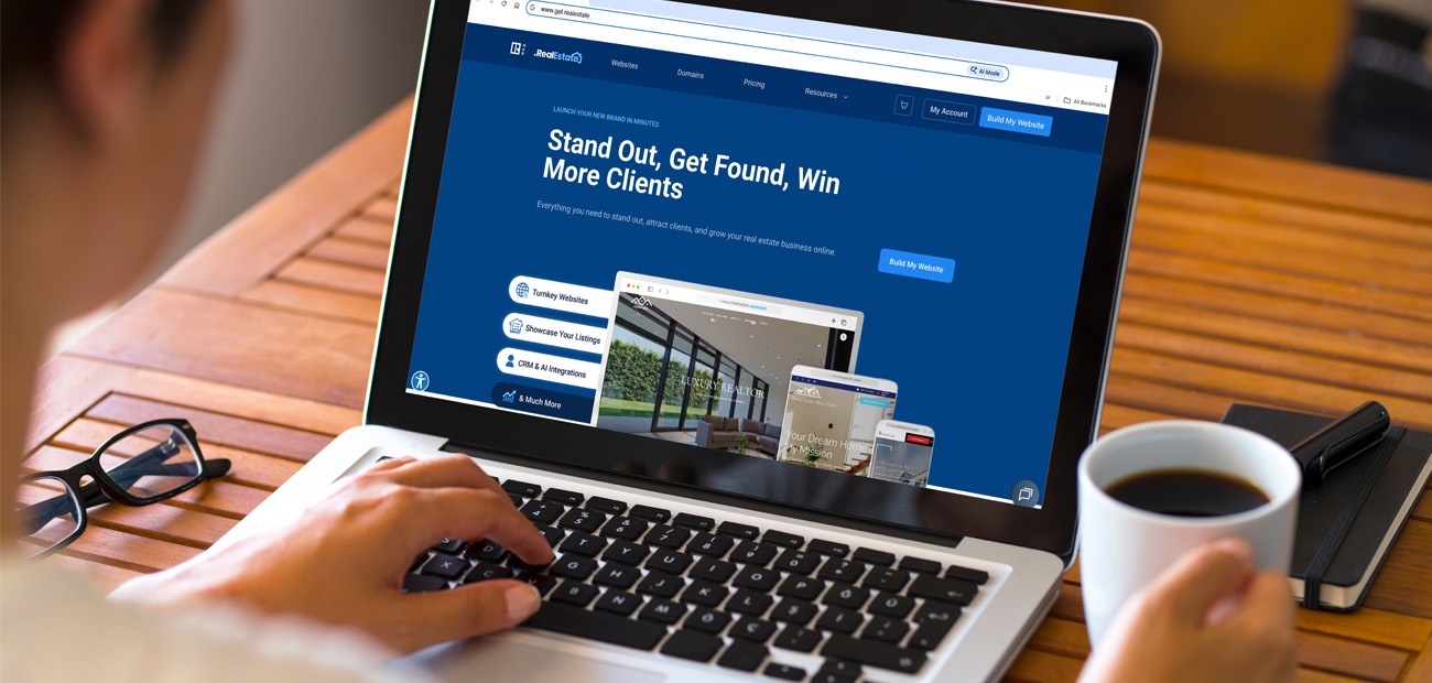 Person using real estate website on laptop